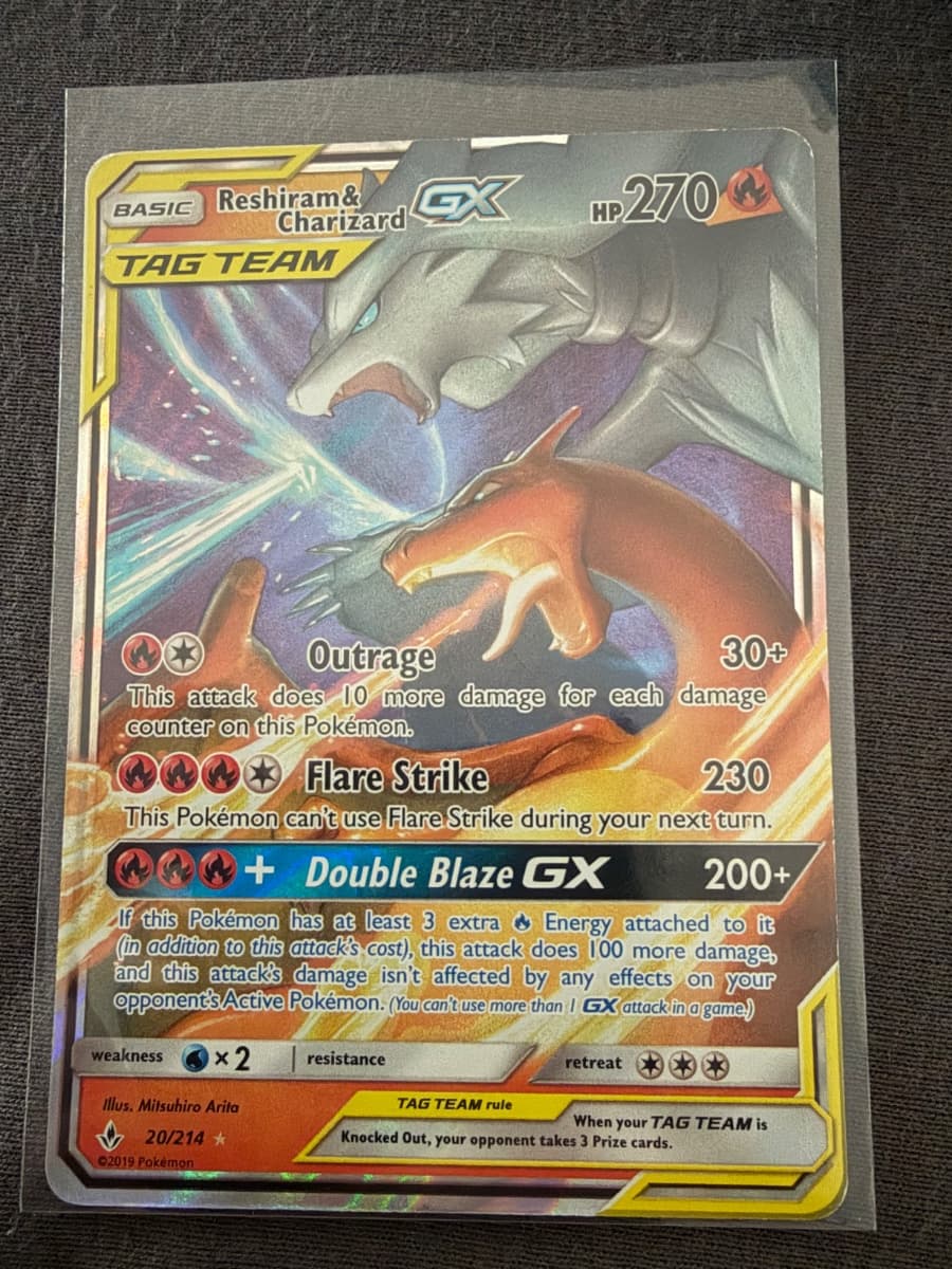 Reshiram & Charizard — Carte #20, état Excellent (visuel provisoire)